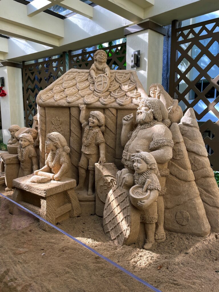 17 Gorgeous Waikiki Hotel Christmas Trees Hawaii Calling a sand sculpture of a group of people