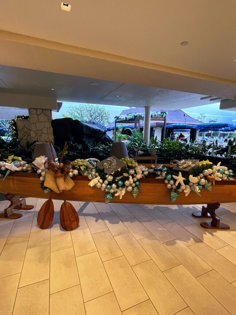 17 Gorgeous Waikiki Hotel Christmas Trees Hawaii Calling a wooden canoe with christmas decorations