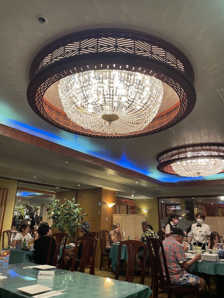 Kirin Waikiki | Mysterious Underground Dinner Review Hawaii Calling a group of people sitting at tables in a restaurant