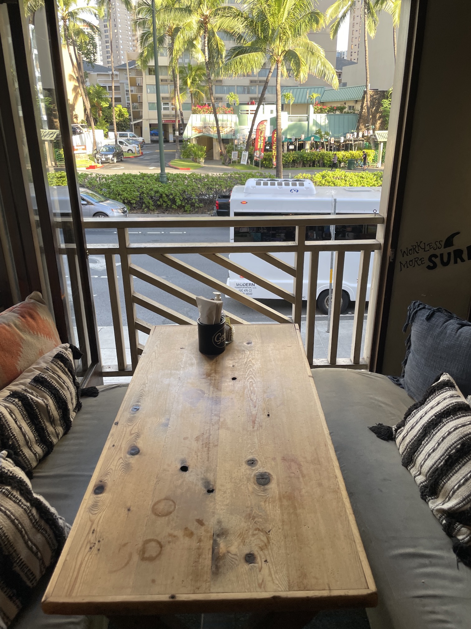 Goofy Cafe & Dine | Breakfast Review Hawaii Calling a table with pillows and a cup on it