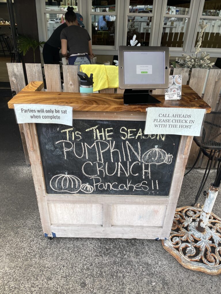 Over Easy Kailua | Breakfast Review Hawaii Calling a sign on a chalkboard