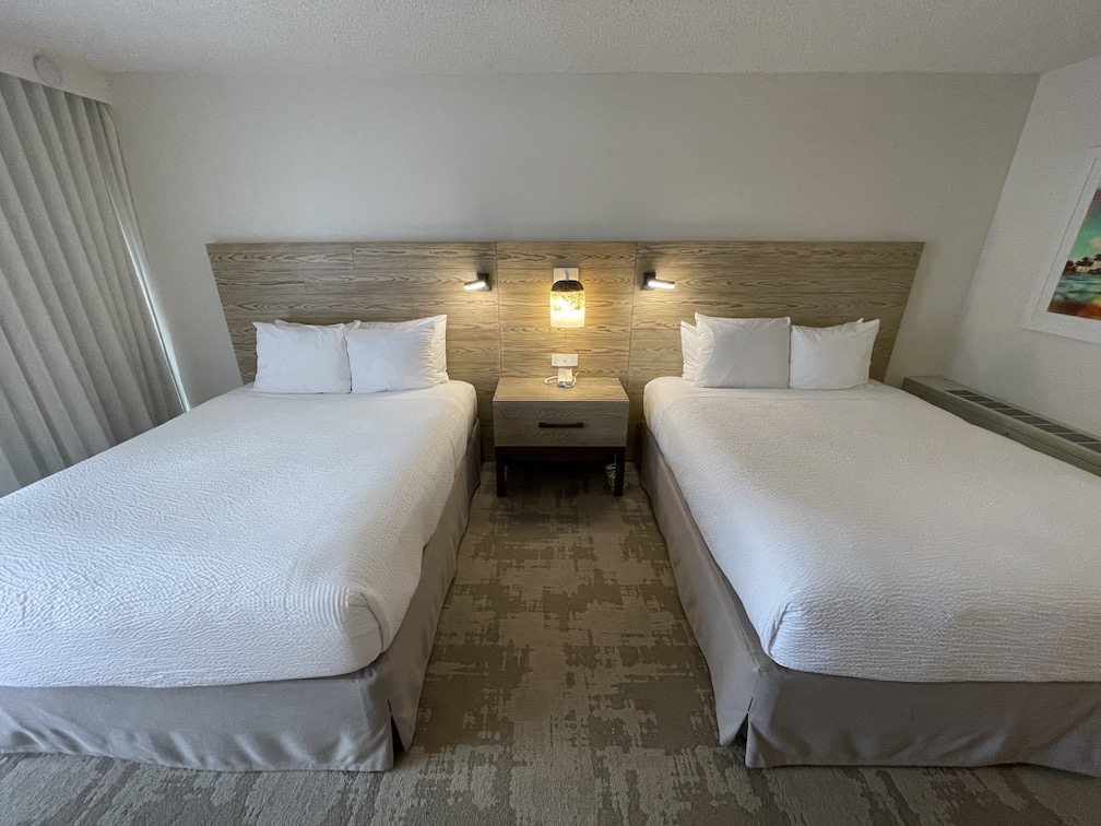 Review & Video: 'Alohilani Resort Waikiki Beach, A Unique Oasis Hawaii Calling twin queen beds at the Alohilani resort