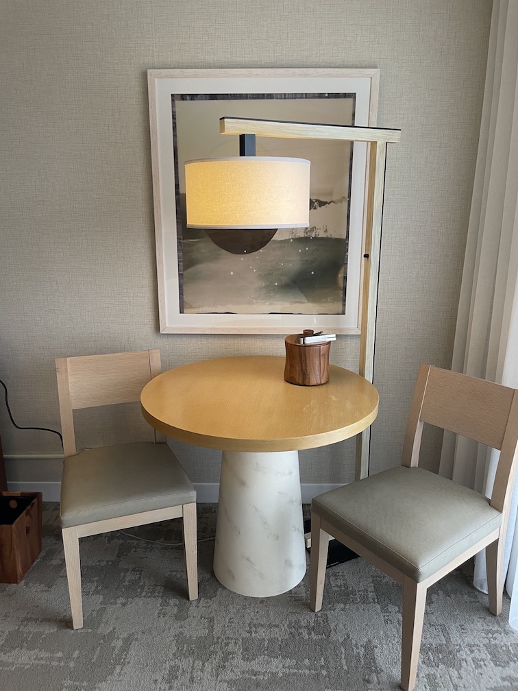 Review & Video: 'Alohilani Resort Waikiki Beach, A Unique Oasis Hawaii Calling a table with a lamp and chairs