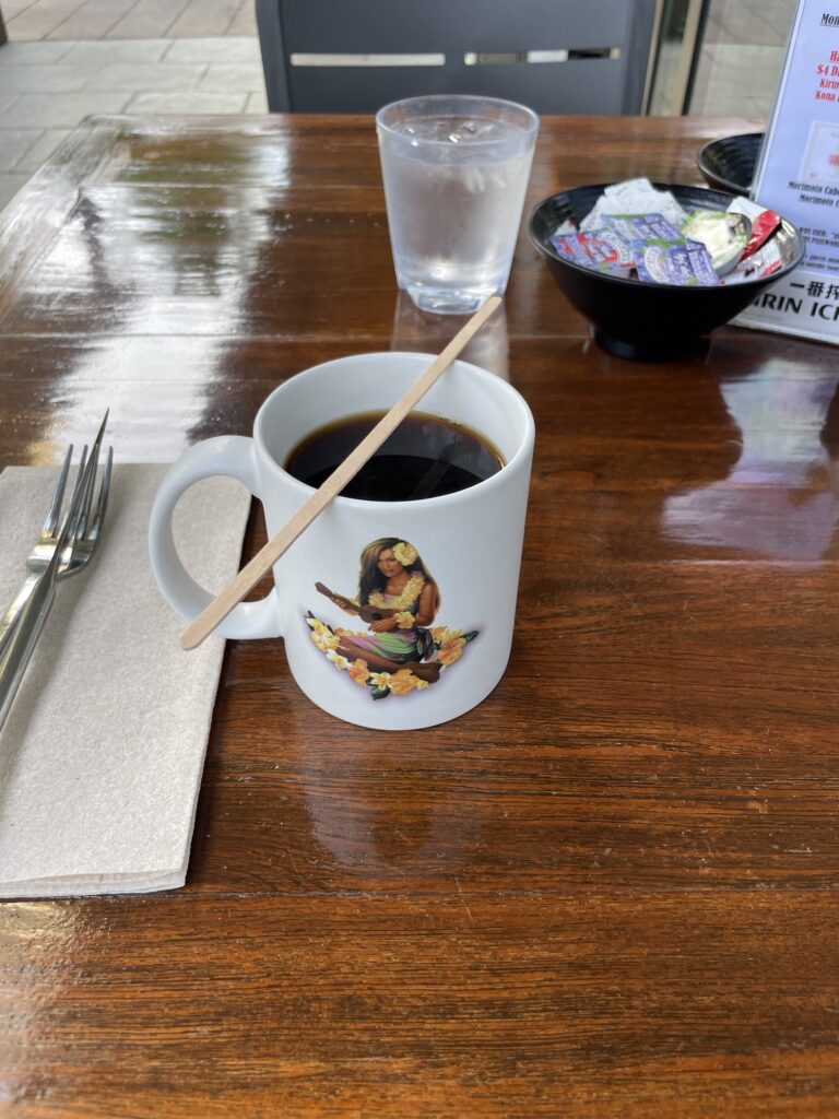 Review & Video: 'Alohilani Resort Waikiki Beach, A Unique Oasis Hawaii Calling a cup of coffee on a table