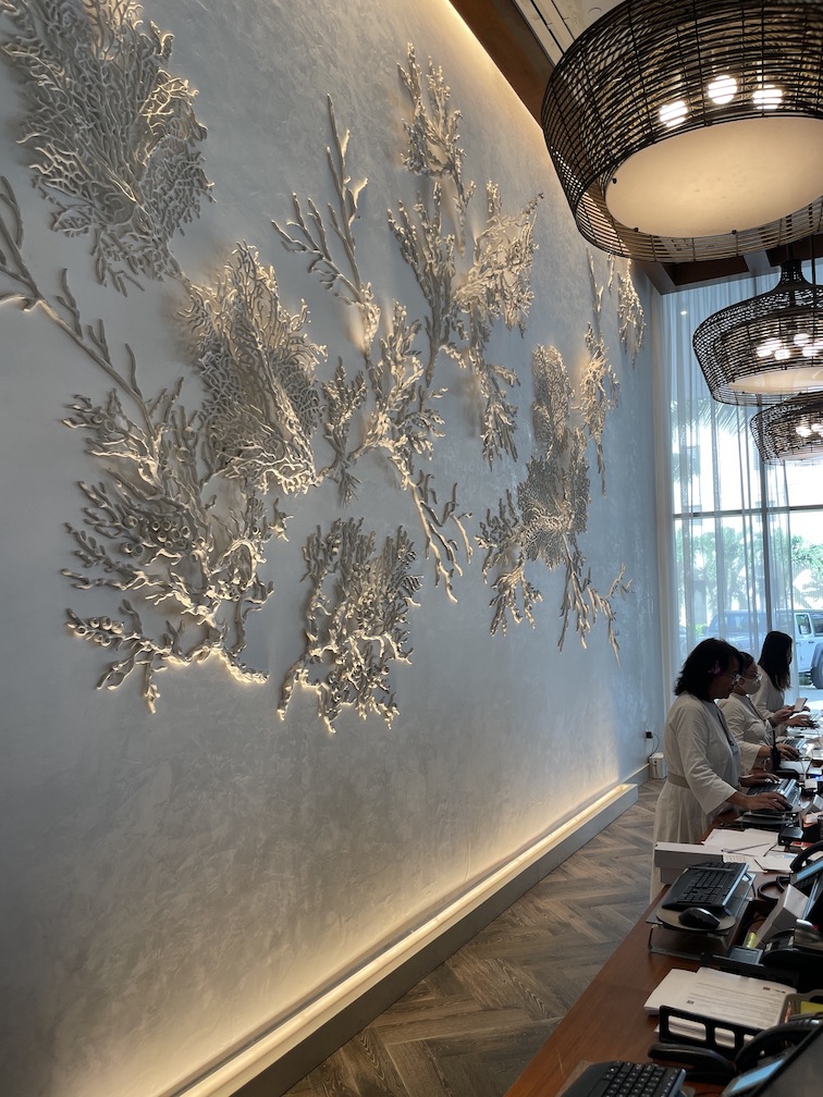 Review & Video: 'Alohilani Resort Waikiki Beach, A Unique Oasis Hawaii Calling a wall with floral designs on it