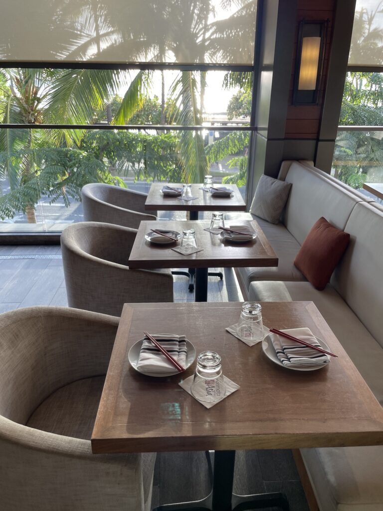 Review & Video: 'Alohilani Resort Waikiki Beach, A Unique Oasis Hawaii Calling a table set up in a restaurant