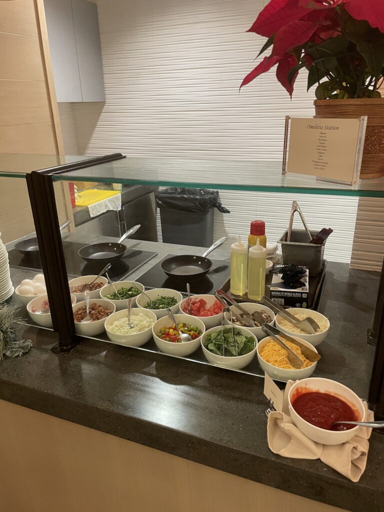Review & Video: 'Alohilani Resort Waikiki Beach, A Unique Oasis Hawaii Calling a counter with bowls of food on it