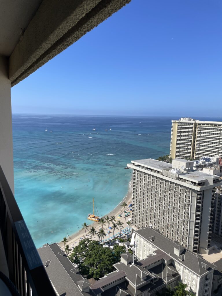 Review: Hyatt Regency Waikiki, Amazing With An Achilles Heel Hawaii Calling a view of a beach and buildings from a balcony