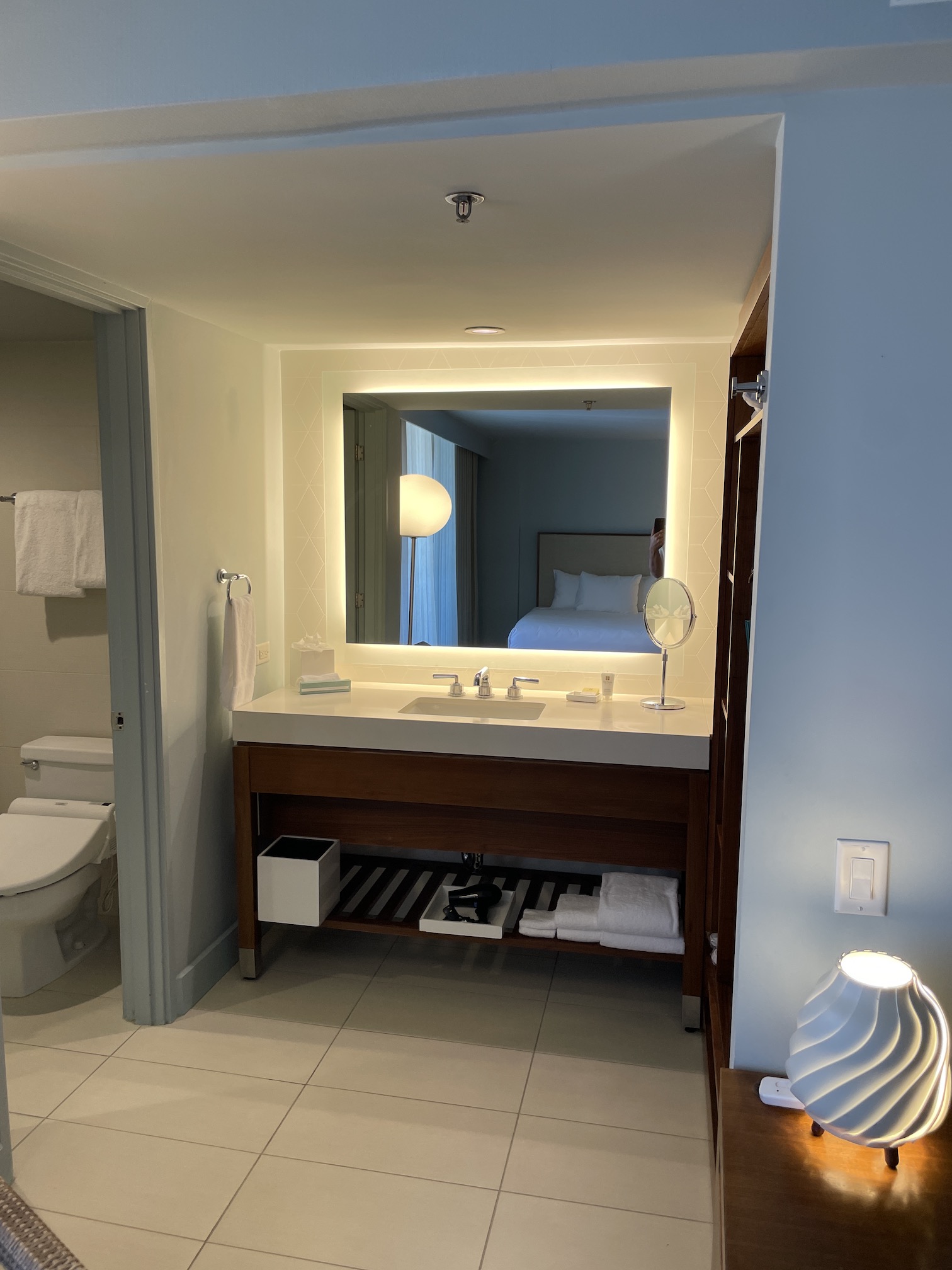 Review: Hyatt Regency Waikiki, Amazing With An Achilles Heel Hawaii Calling a bathroom with a mirror and a toilet