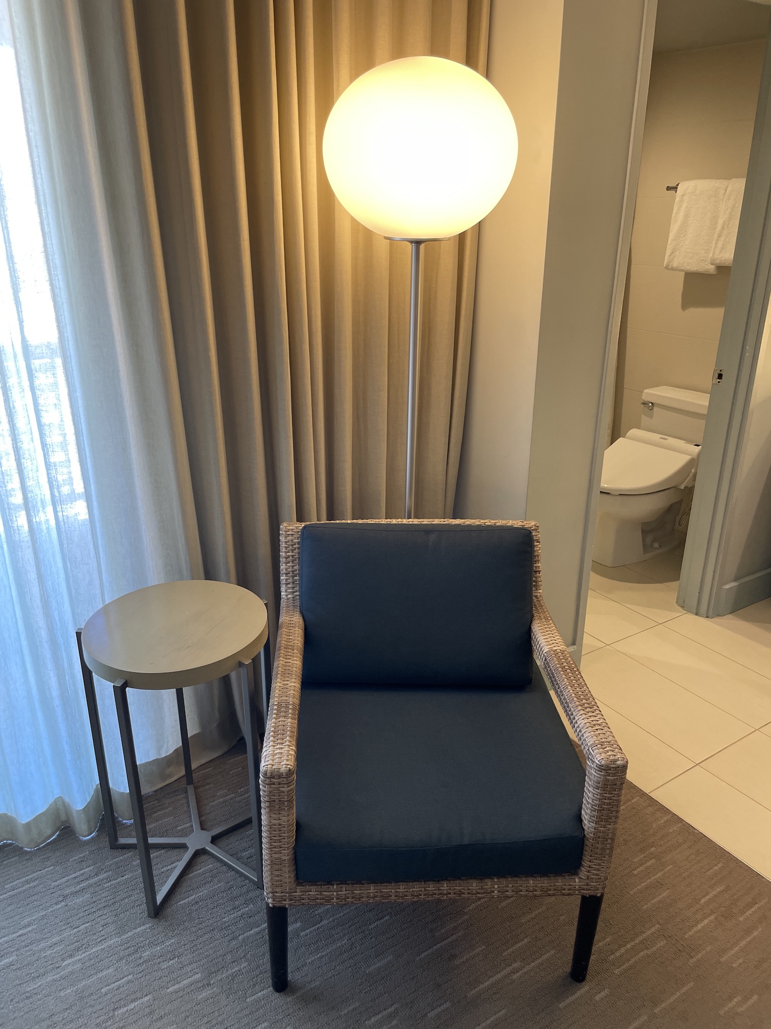 Review: Hyatt Regency Waikiki, Amazing With An Achilles Heel Hawaii Calling a chair and a lamp in a room