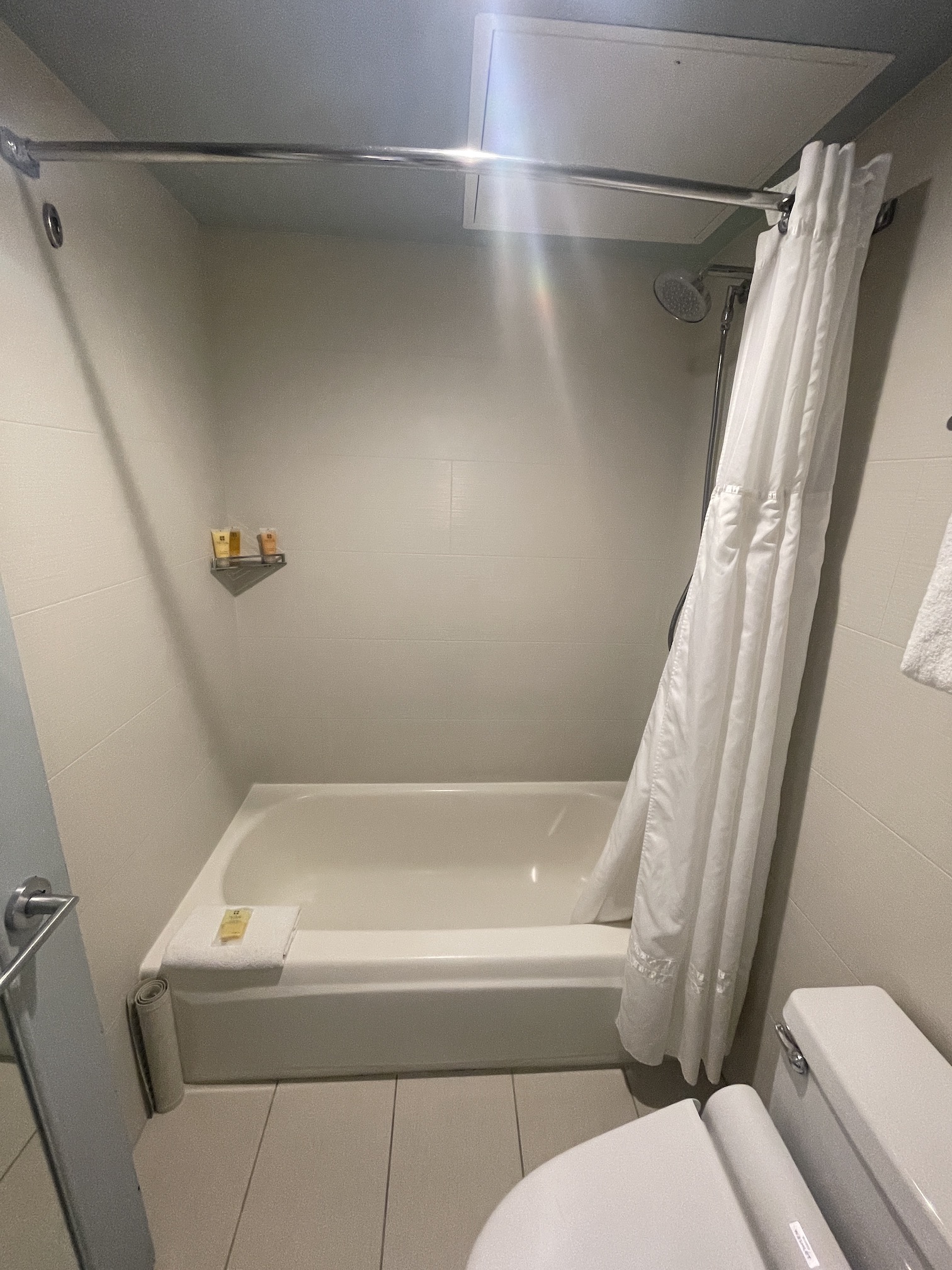 Review: Hyatt Regency Waikiki, Amazing With An Achilles Heel Hawaii Calling a bathroom with a shower curtain and toilet