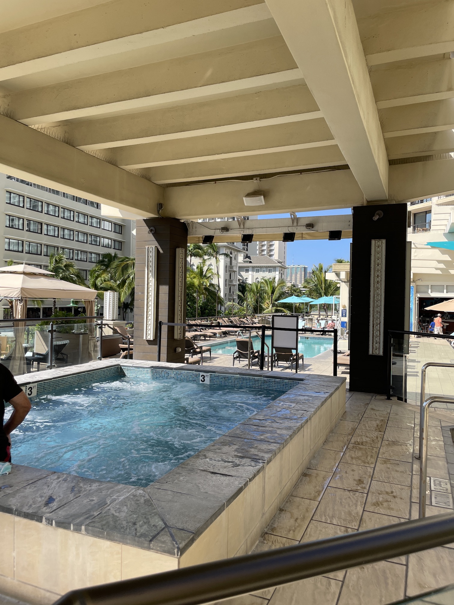 Review: Hyatt Regency Waikiki, Amazing With An Achilles Heel Hawaii Calling a man standing in a pool