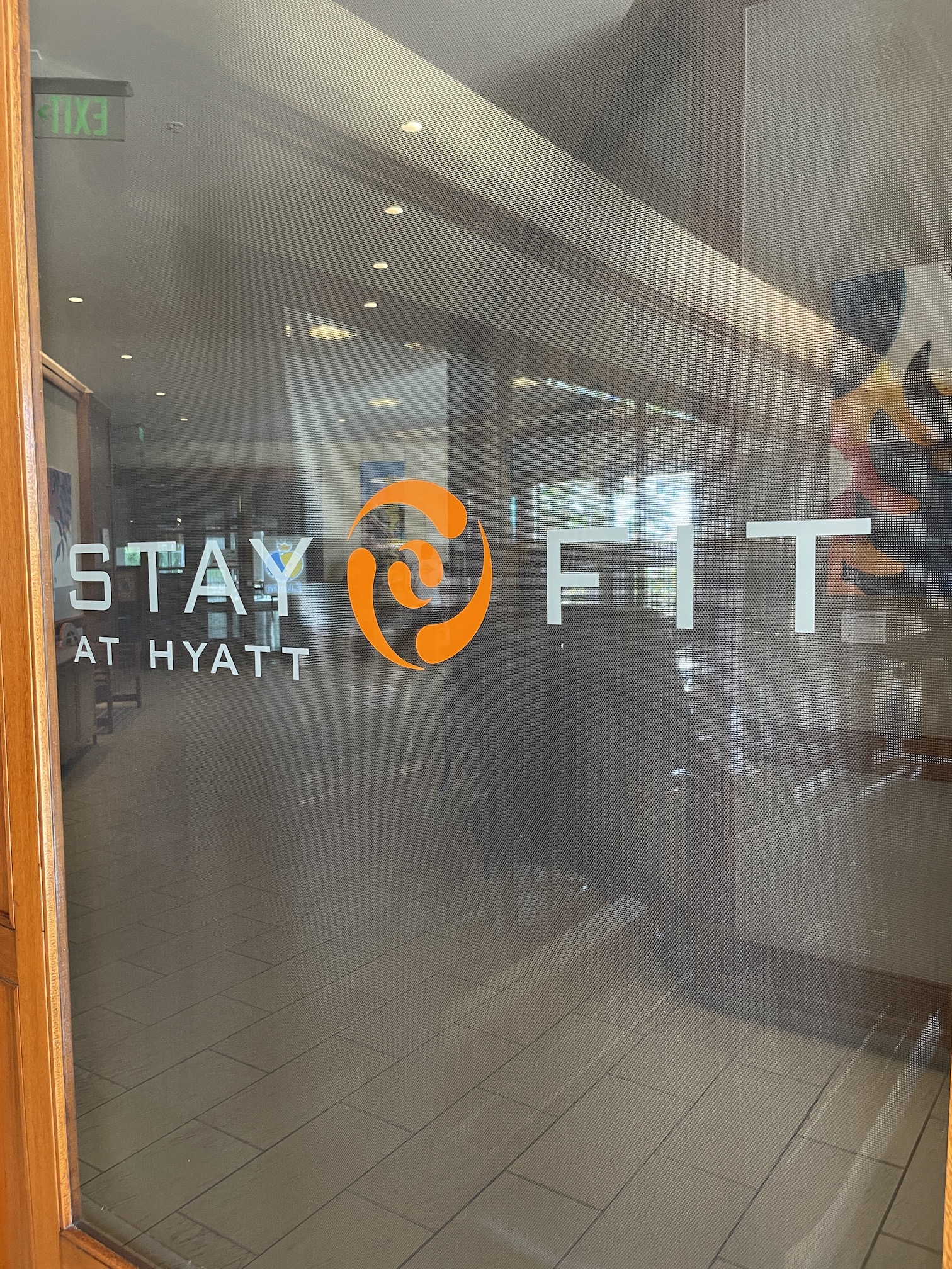 Review: Hyatt Regency Waikiki, Amazing With An Achilles Heel Hawaii Calling a glass door with a logo on it