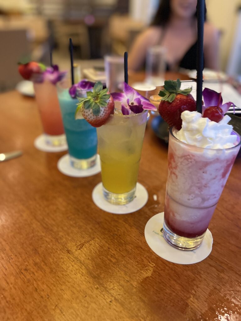 Review: Hyatt Regency Waikiki, Amazing With An Achilles Heel Hawaii Calling a group of drinks on a table