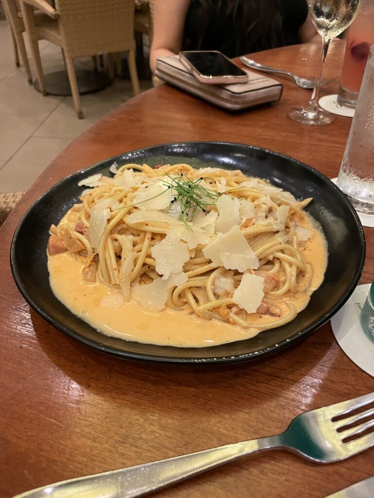 Review: Hyatt Regency Waikiki, Amazing With An Achilles Heel Hawaii Calling a plate of pasta with sauce and cheese on a table