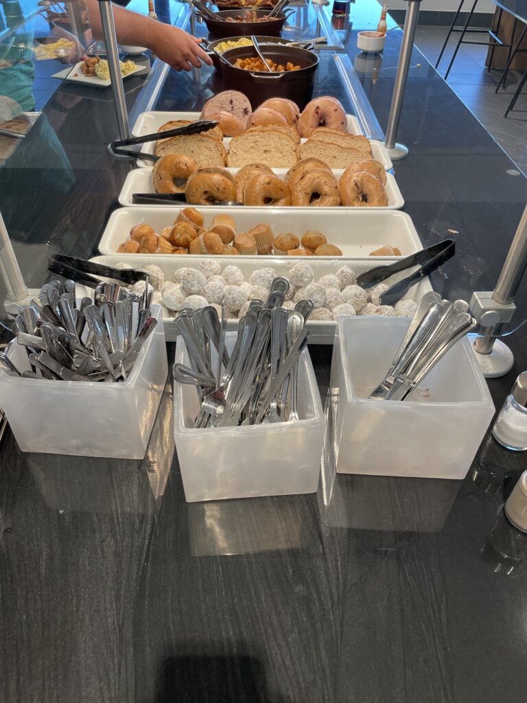 Review: American Express Centurion Lounge Phoenix - Small & Efficient Hawaii Calling a trays of food on a table