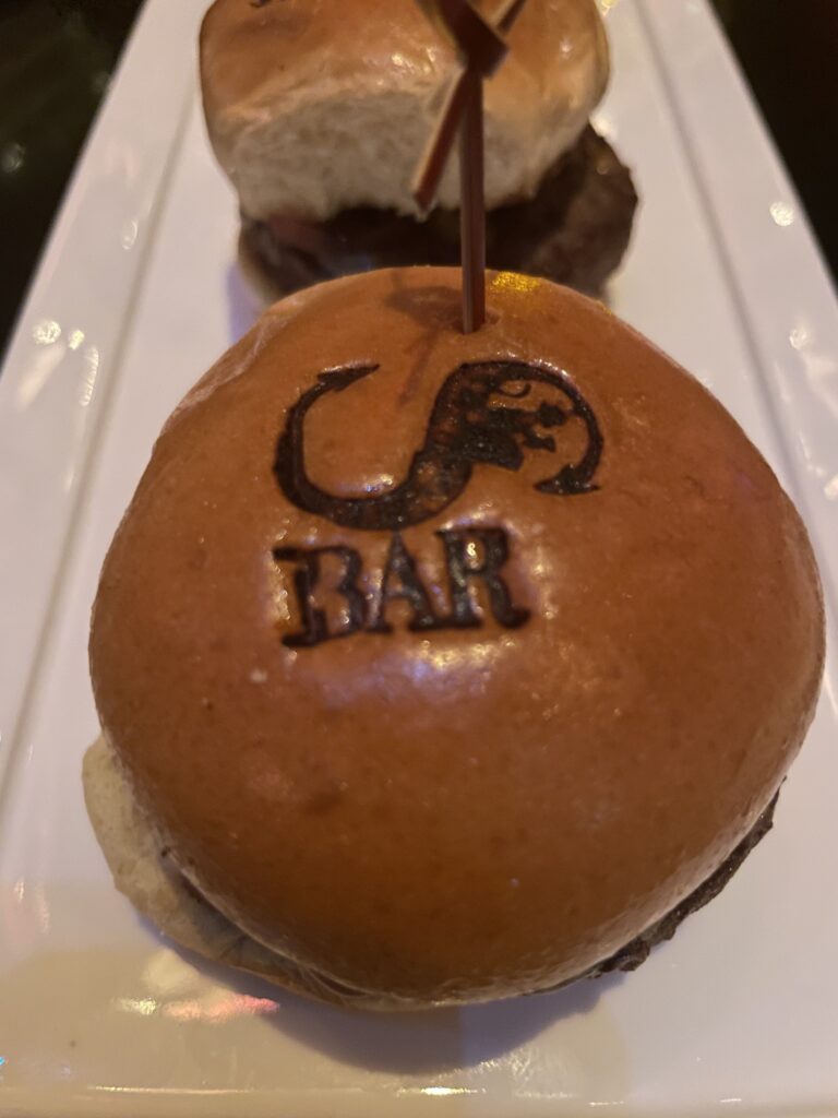 Review: Sexy Sultry S Bar Las Vegas Hawaii Calling a burger with a toothpick on it