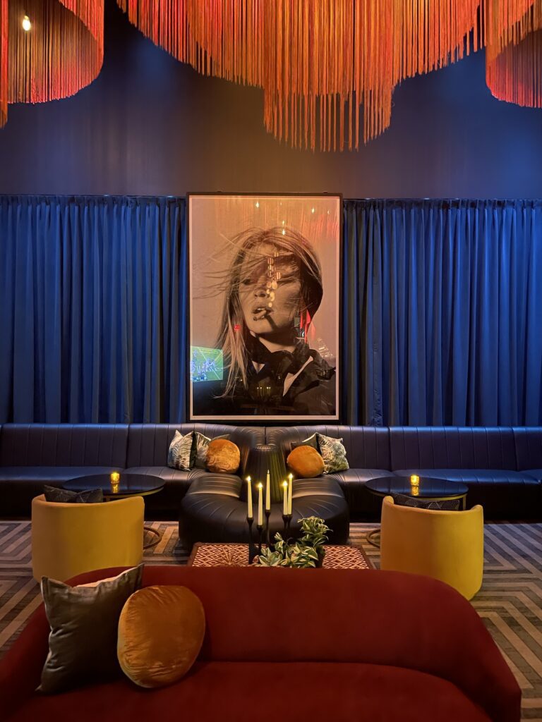Review: Sexy Sultry S Bar Las Vegas Hawaii Calling a room with a large picture of a woman smoking a cigarette