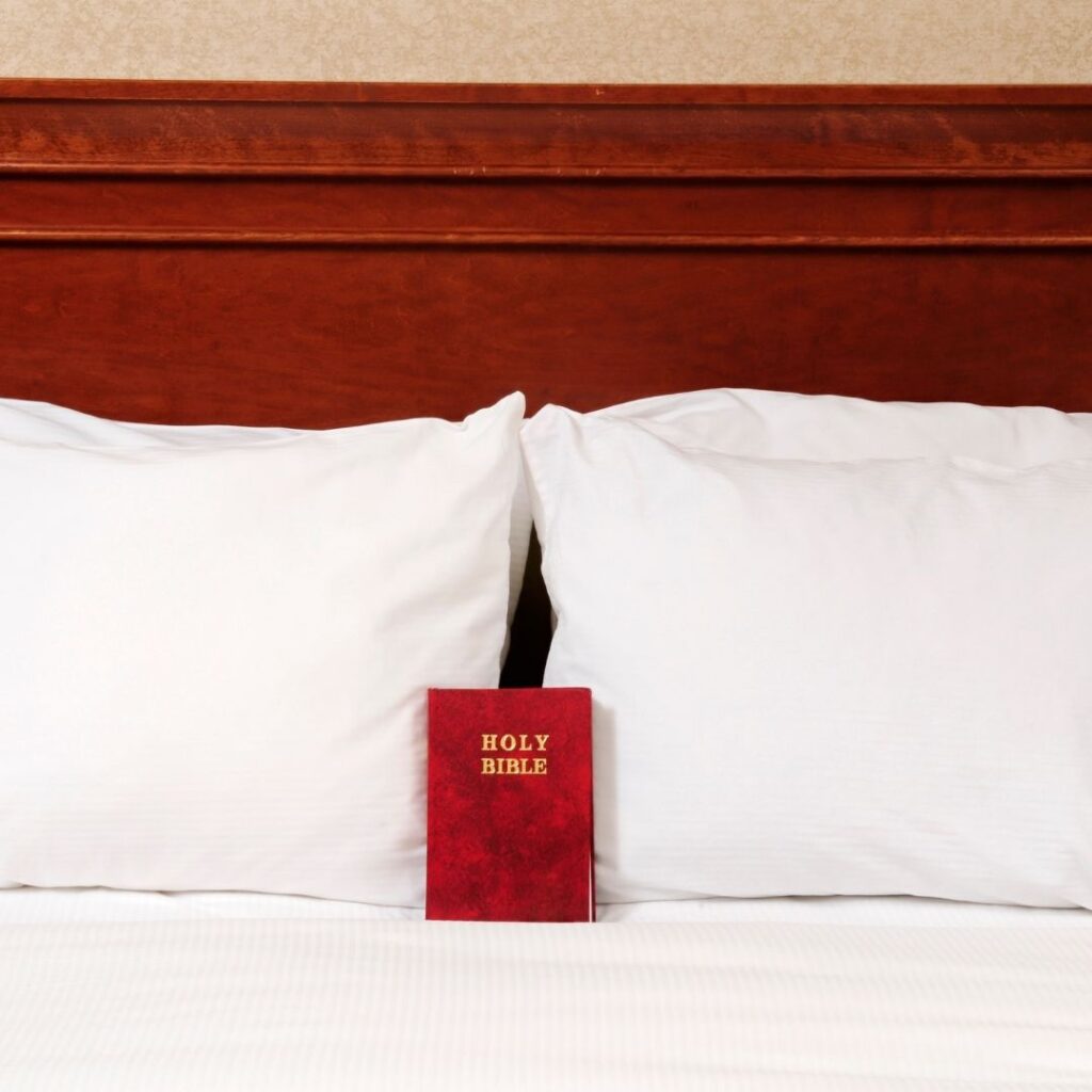 Why Do Hotels Have Bibles in Them? (2025) Hawaii Calling Why do hotels have bibles in them. Bible in hotel room bed