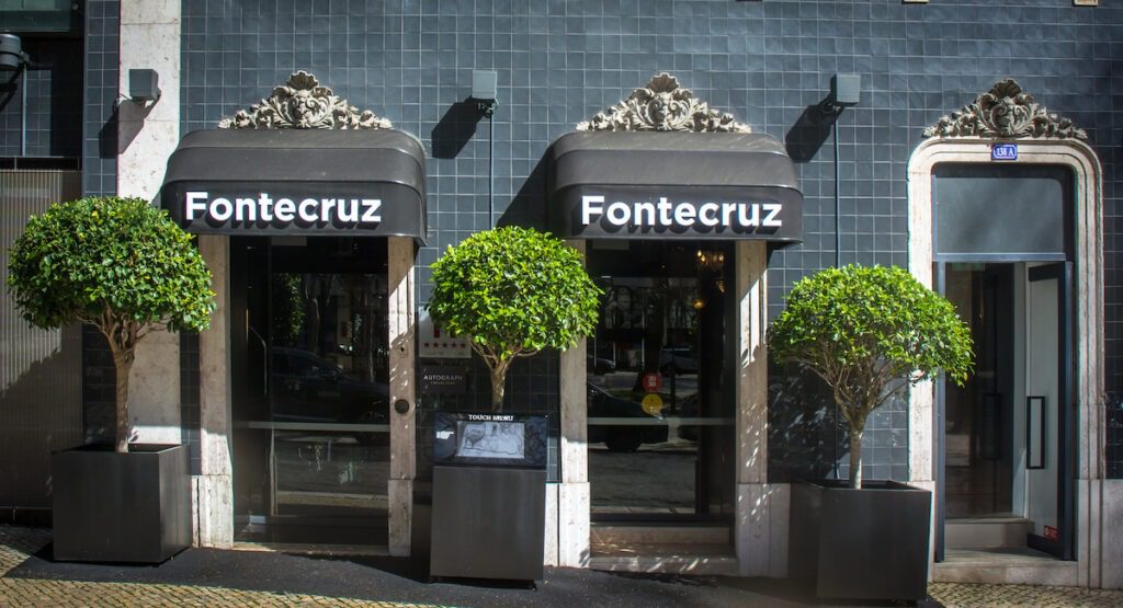 Fontecruz Lisboa an Autograph Collection Hotel, Classic Vintage Hawaii Calling a building with awnings and trees