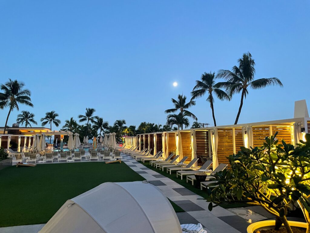 Review & Video: Waikiki Beach Marriott Resort & Spa Hawaii Calling a row of lounge chairs and umbrellas on a beach