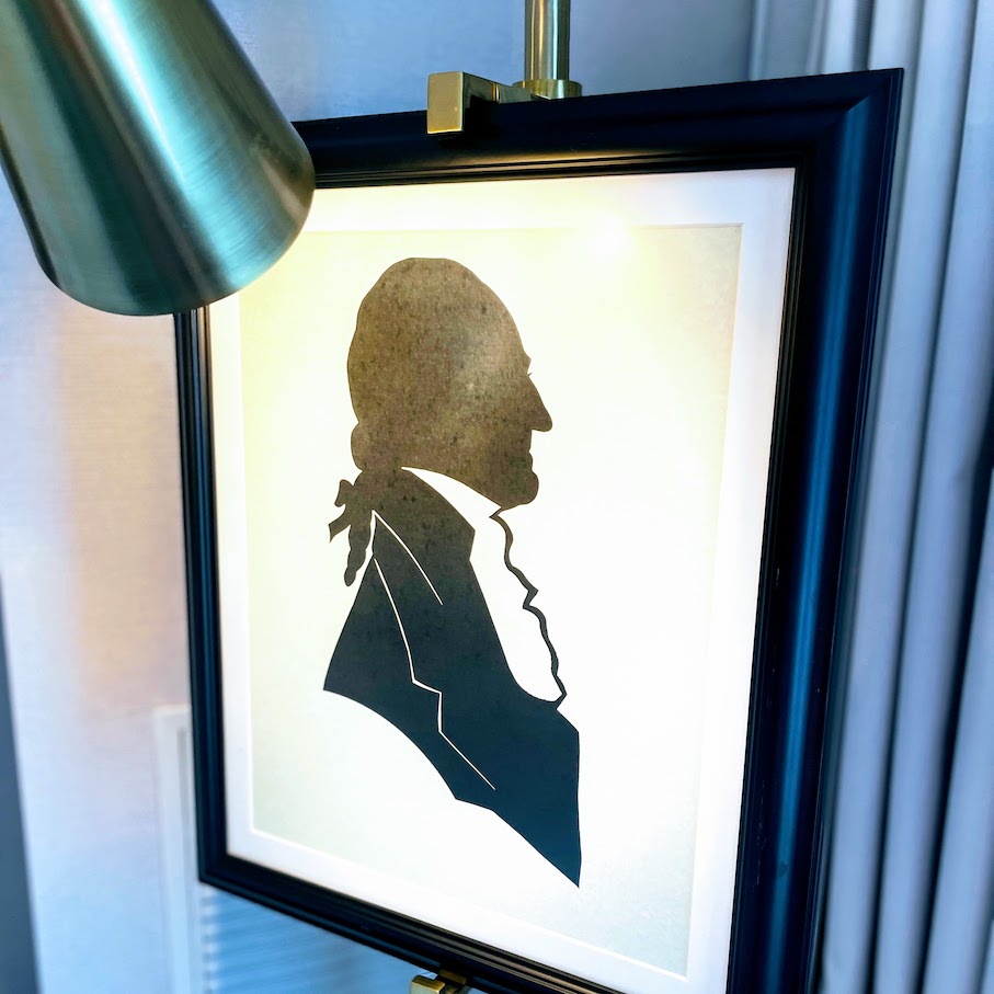 Review & Video: The Ritz-Carlton Washington DC, Refined Luxury Hawaii Calling a framed picture of a man
