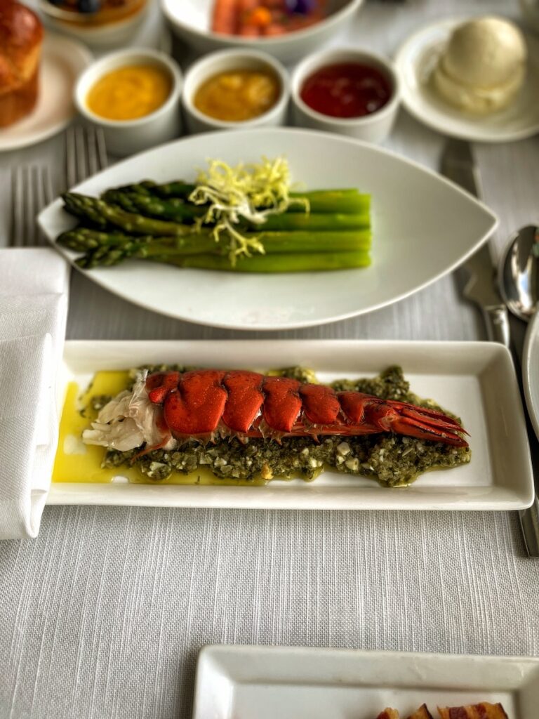 Review & Video: The Kahala Hotel and Resort, Presidential Luxury Hawaii Calling a lobster on a plate next to a plate of asparagus