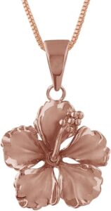 20 Best Souvenirs From Hawaii (2025) To Cherish Forever Hawaii Calling a gold pendant with a flower