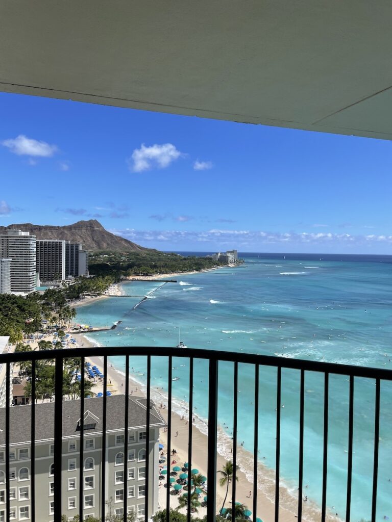 The 15 Best Hotels On Oahu For Families 2025 Hawaii Calling a view of a beach and ocean from a balcony