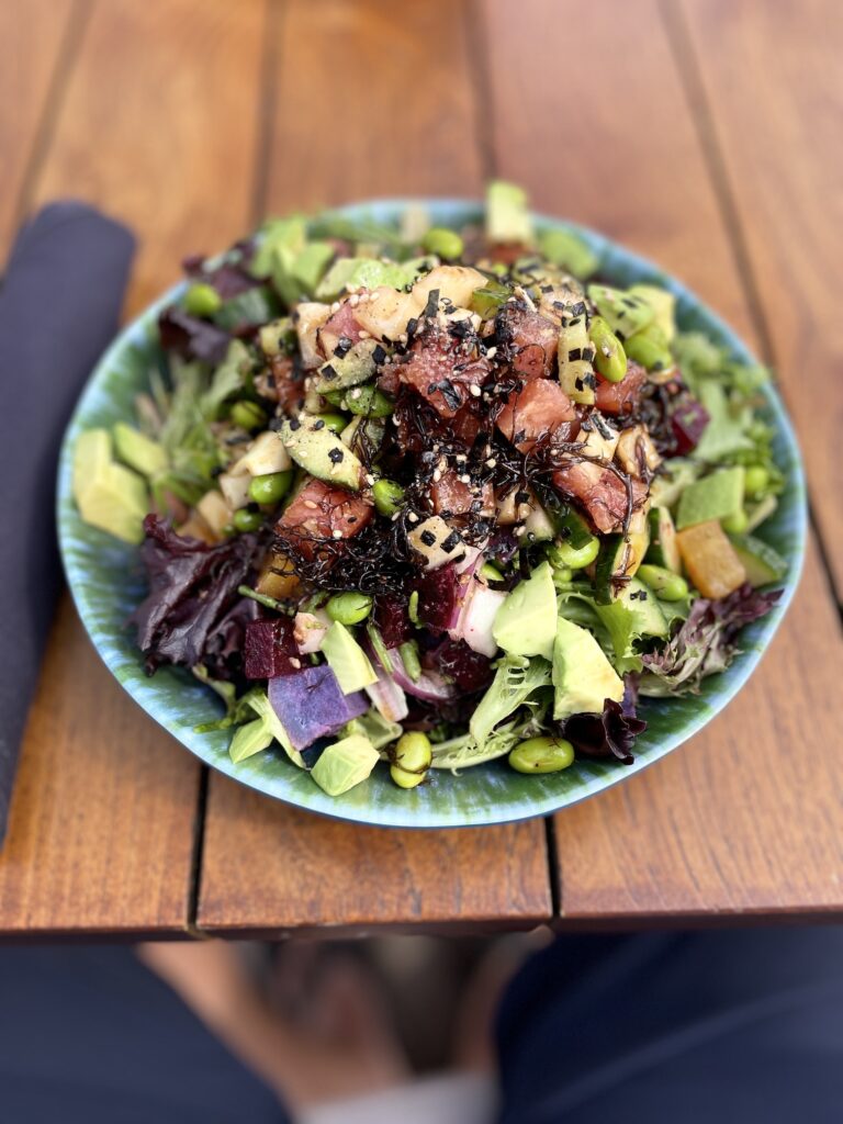 Review & Video: 'Alohilani Resort Waikiki Beach, A Unique Oasis Hawaii Calling a bowl of salad on a table