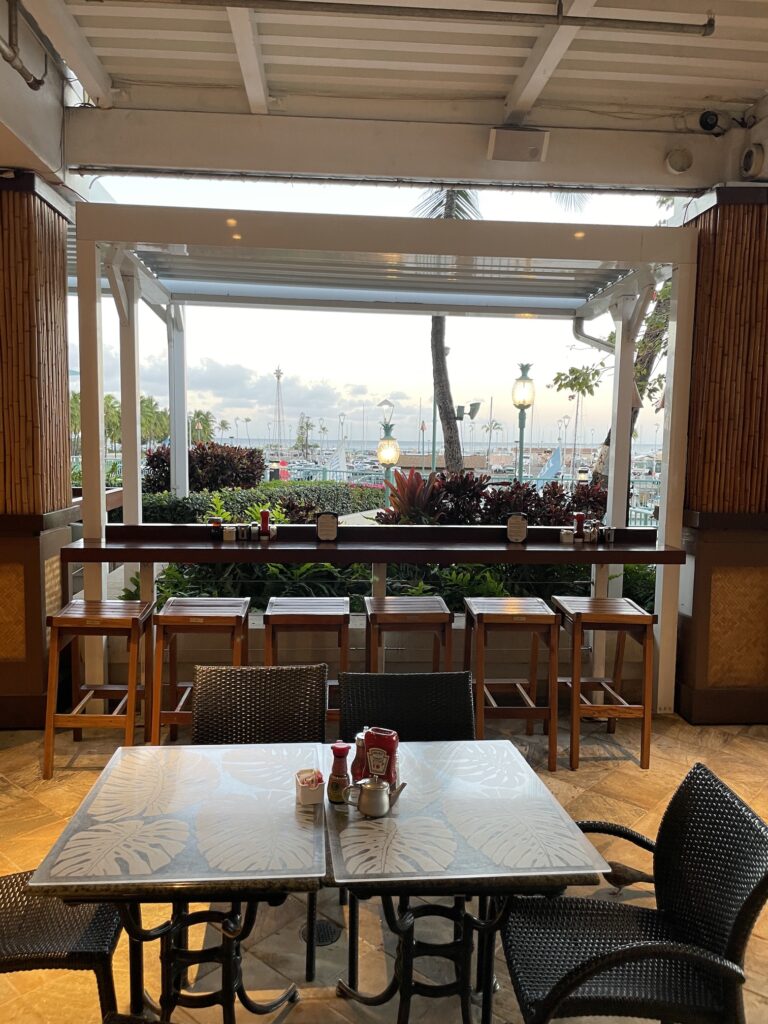 Cinnamon's Ilikai Waikiki | Legendary Breakfast Review Hawaii Calling a table and chairs in a restaurant