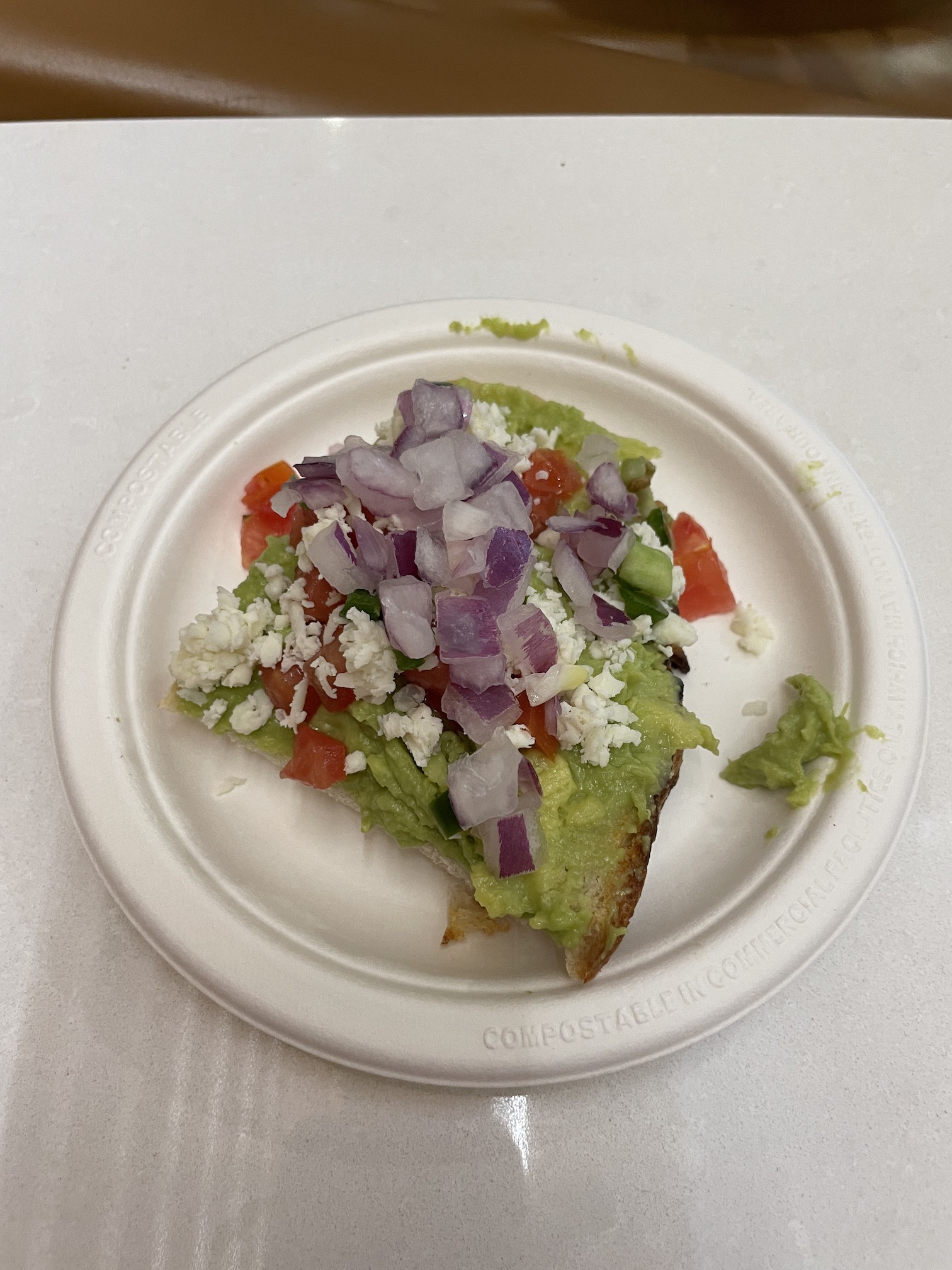 Review: Phoenix Admirals Club Gate A7 Hawaii Calling a plate with food on it