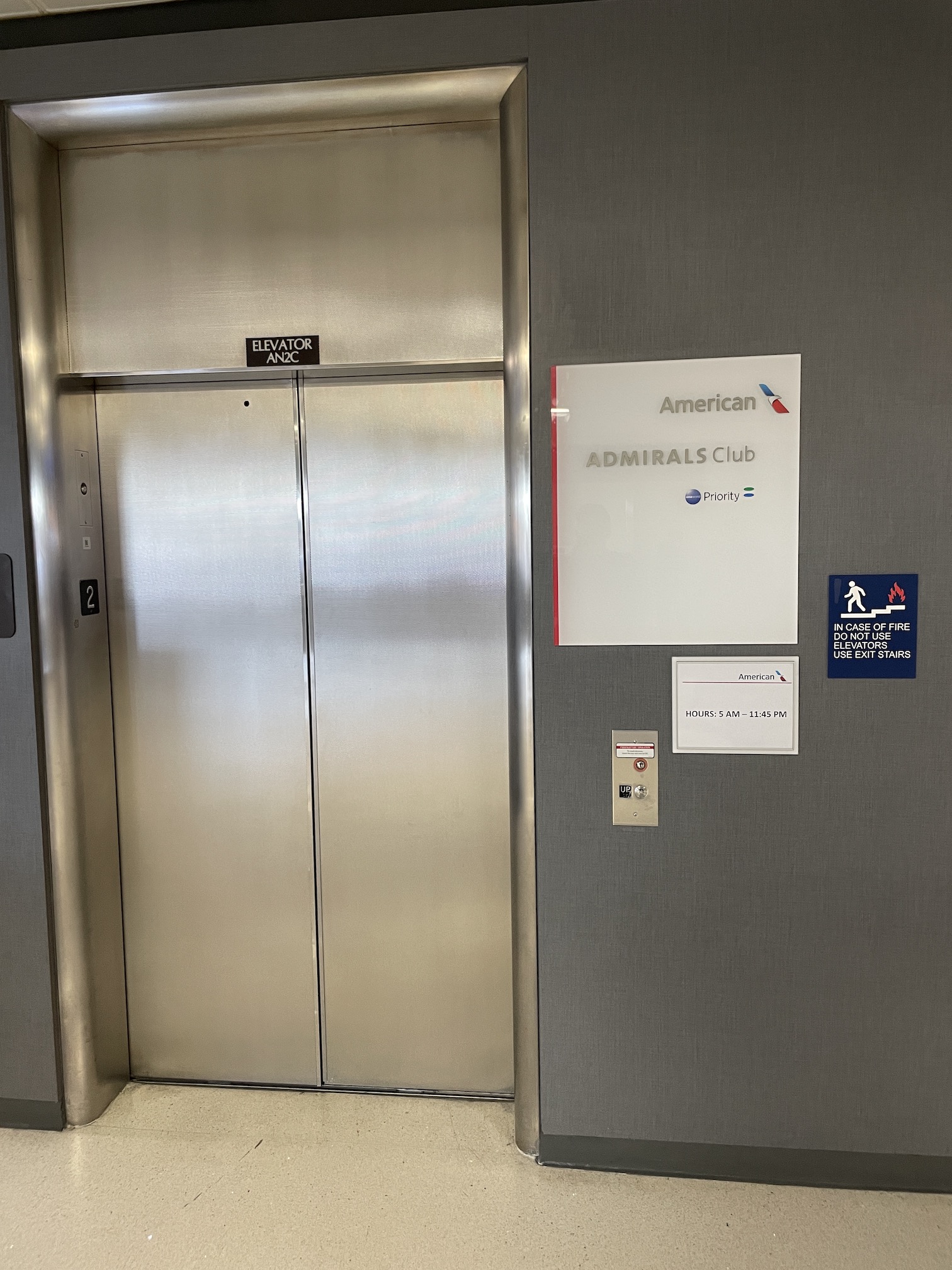Review: Phoenix Admirals Club Gate A7 Hawaii Calling an elevator doors with signs on the wall