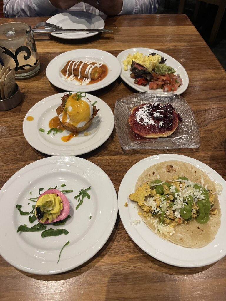 Review: Amazing Border Grill Buffet Las Vegas Hawaii Calling a table with plates of food