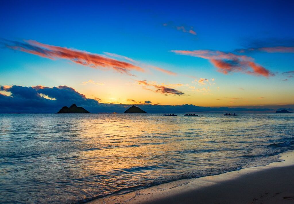 5 Best Sunrise Hikes On Oahu | (2025) Hawaii Calling a sunset over a body of water