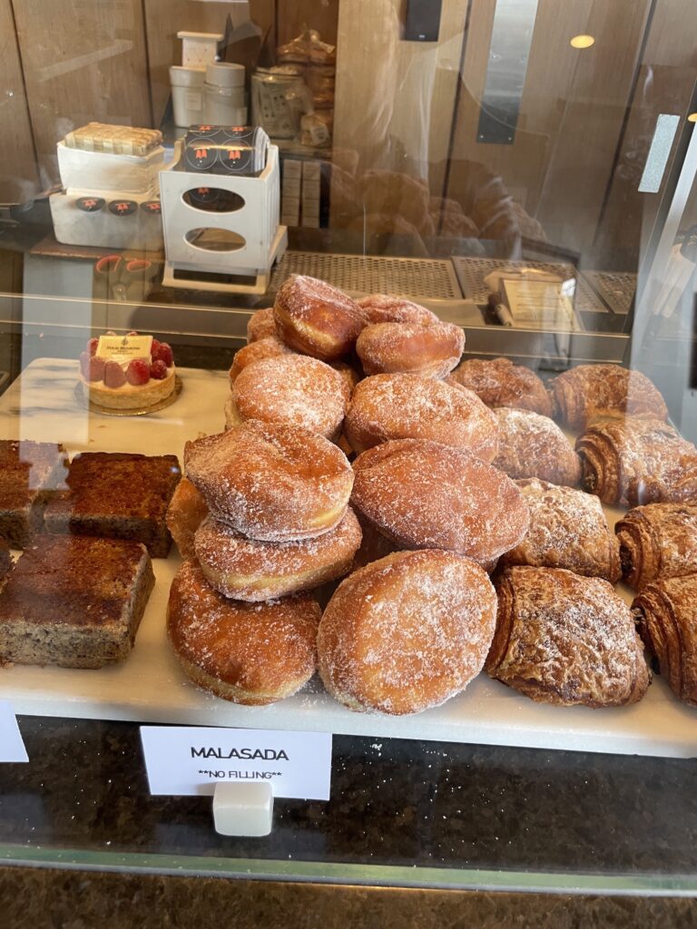 Review & Video: Four Seasons Oahu at Ko Olina, Pinnacle of Luxury Hawaii Calling a display case with pastries and pastries