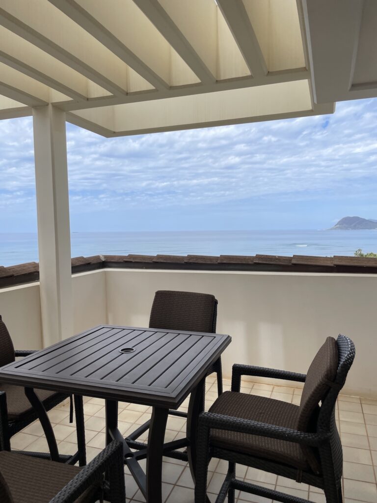 Review & Video: Four Seasons Oahu at Ko Olina, Pinnacle of Luxury Hawaii Calling a table and chairs on a deck overlooking the ocean