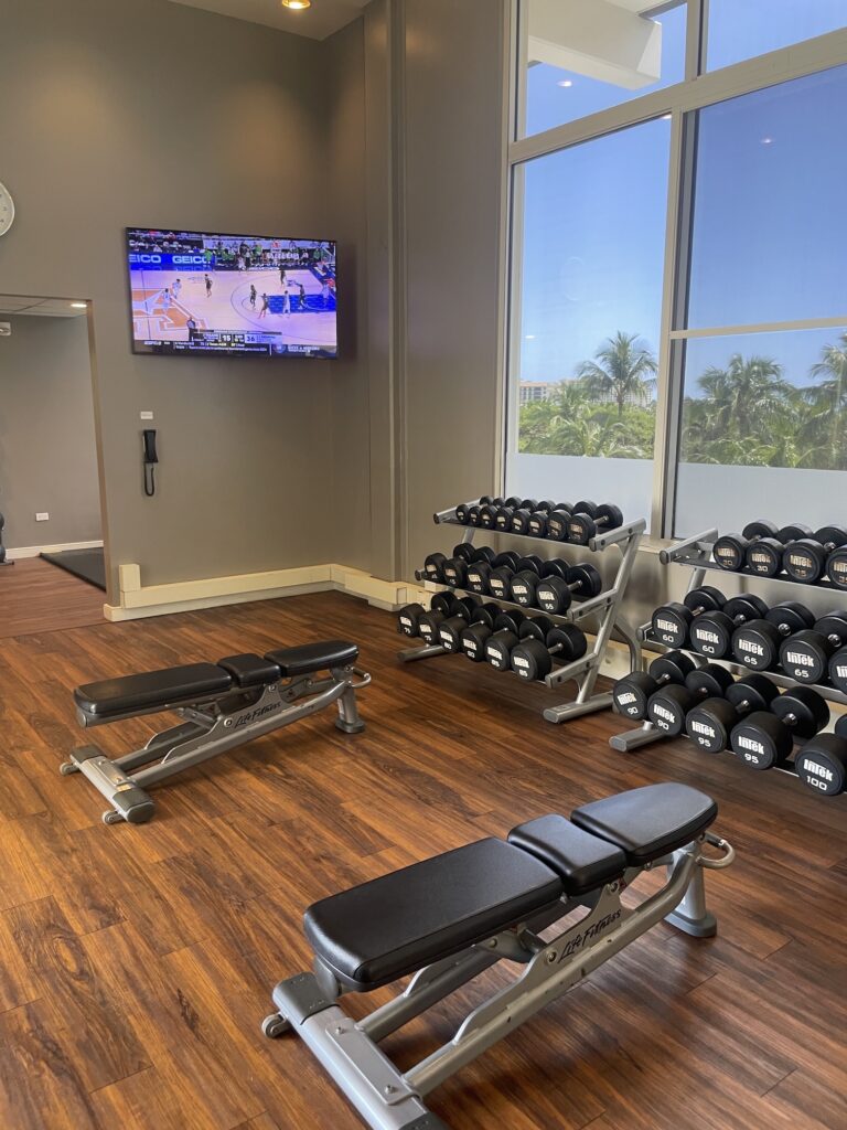 Review & Video: Four Seasons Oahu at Ko Olina, Pinnacle of Luxury Hawaii Calling a room with weights and a television