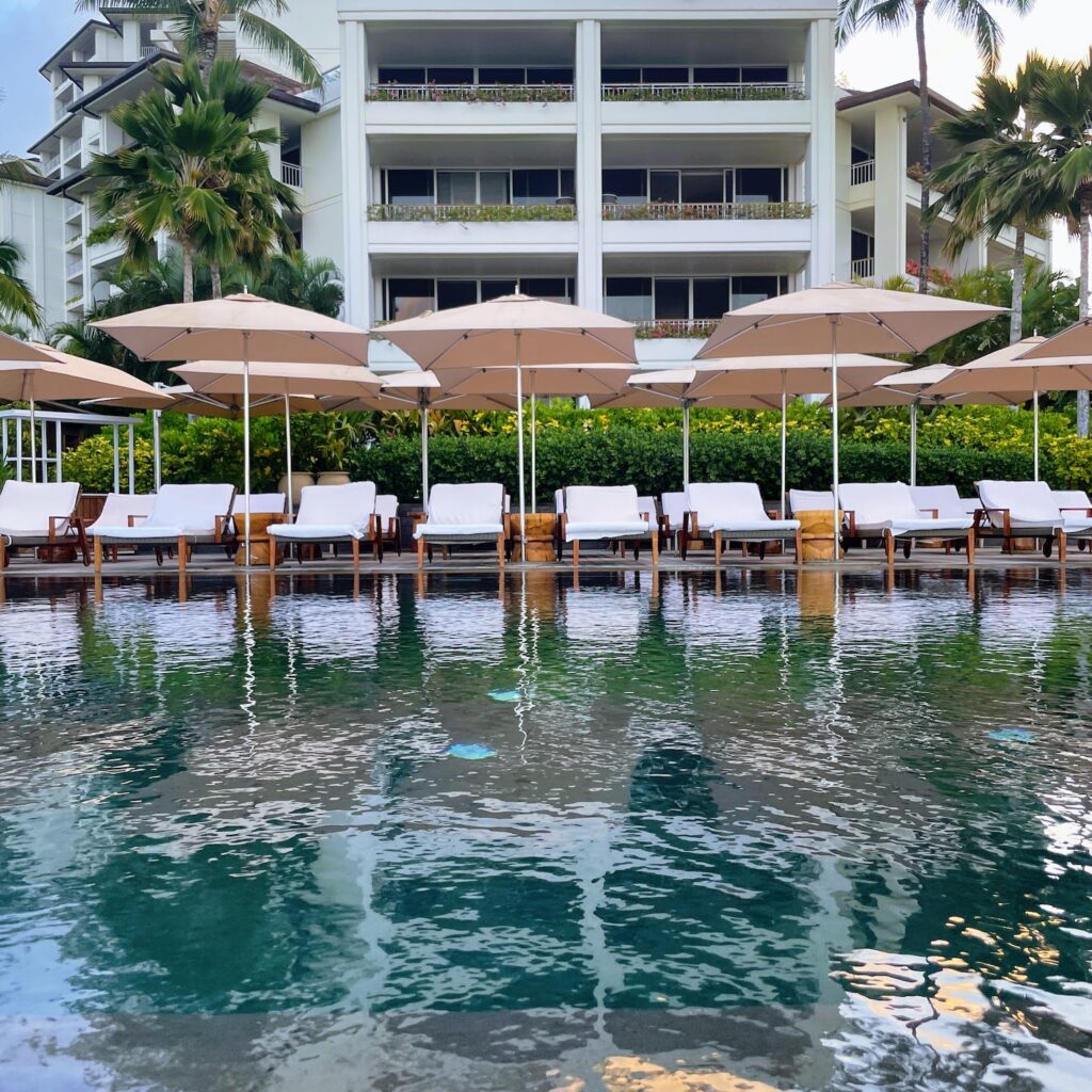 Review & Video: Four Seasons Oahu at Ko Olina, Pinnacle of Luxury Hawaii Calling a pool with umbrellas and chairs
