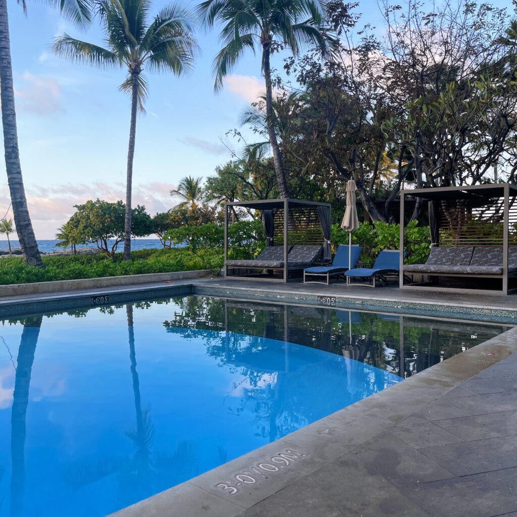 Review & Video: Four Seasons Oahu at Ko Olina, Pinnacle of Luxury Hawaii Calling a pool with lounge chairs and trees
