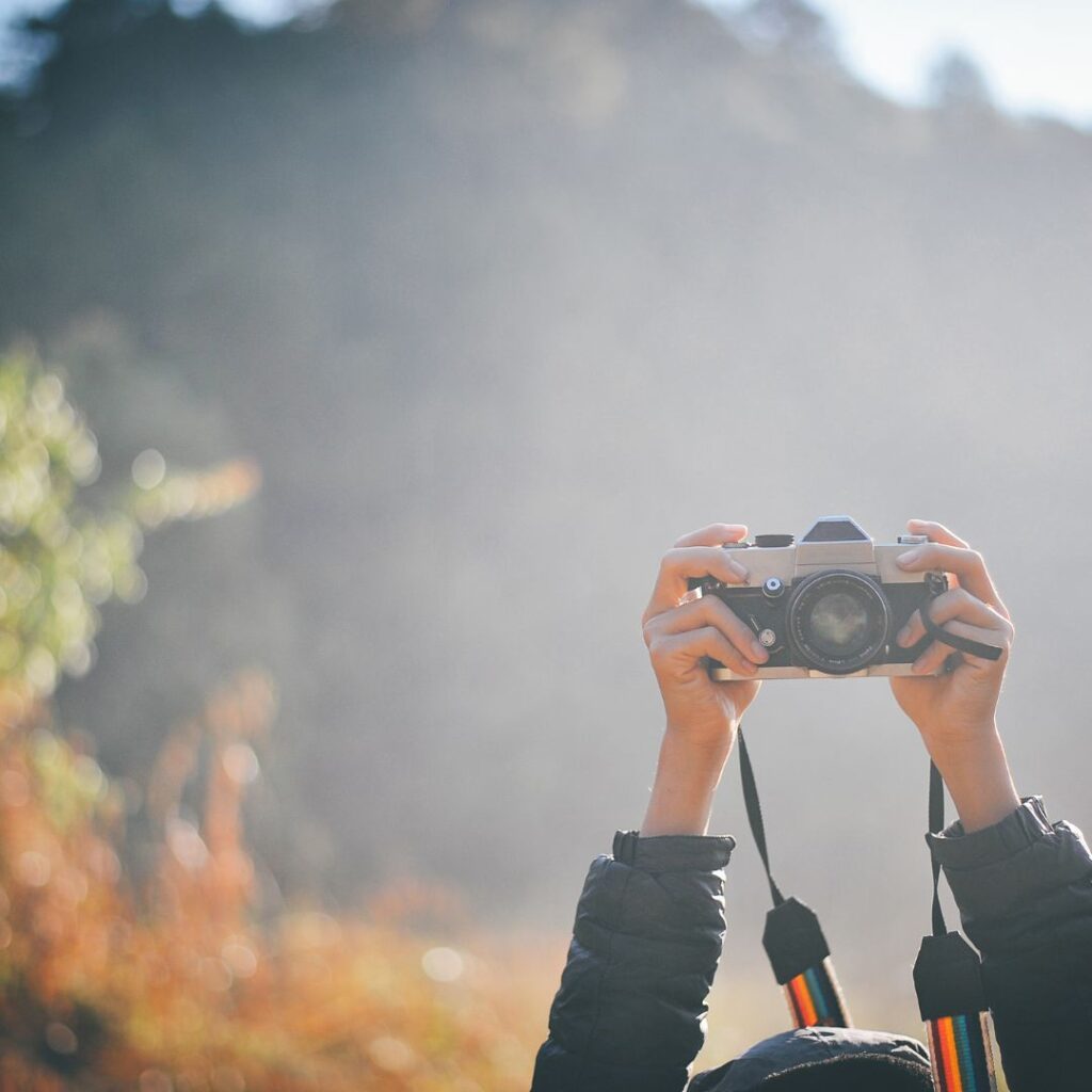 10 Essential Things to Pack For Your Trip To Hawai'i Hawaii Calling a person holding a camera