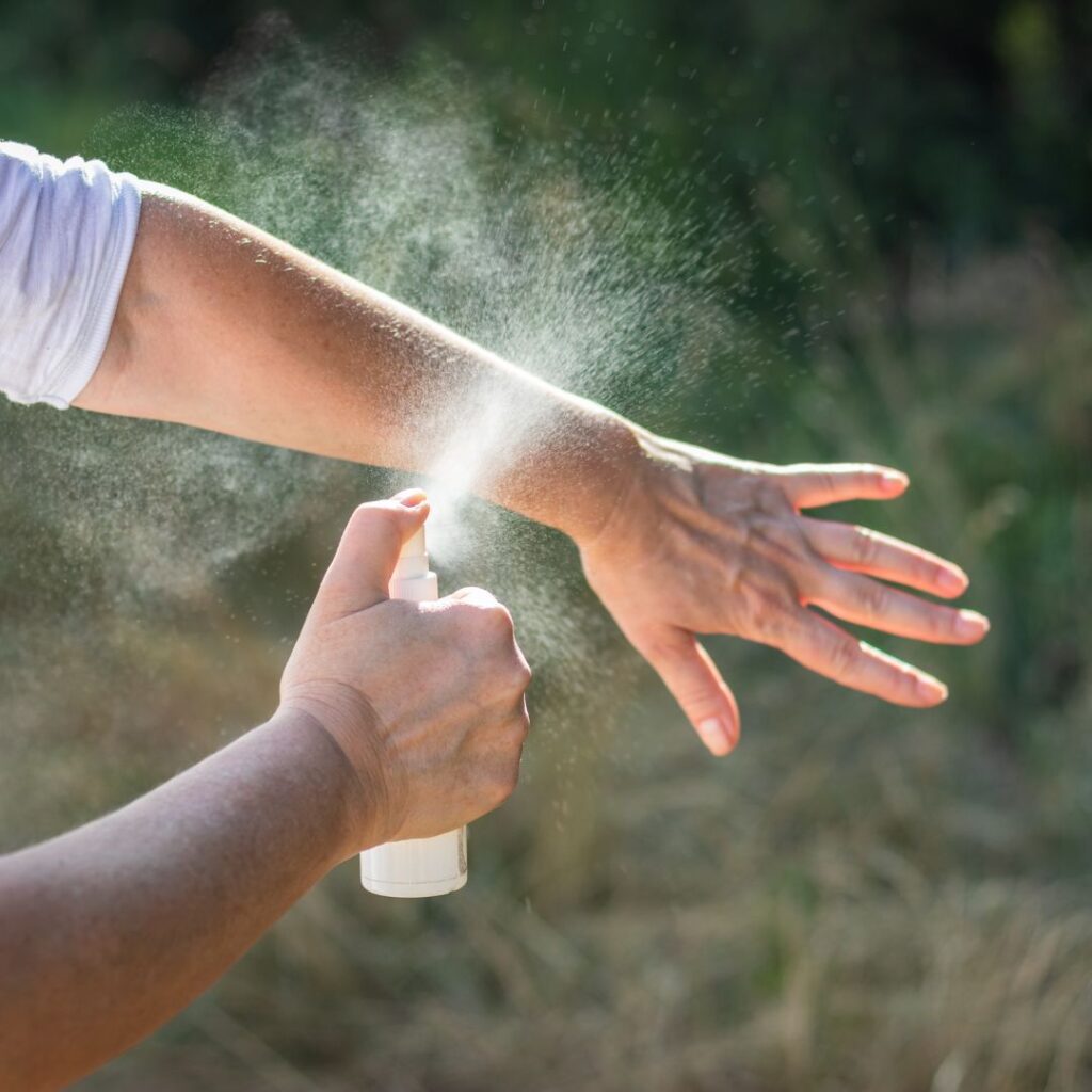 10 Essential Things to Pack For Your Trip To Hawai'i Hawaii Calling a person spraying a hand with a spray bottle