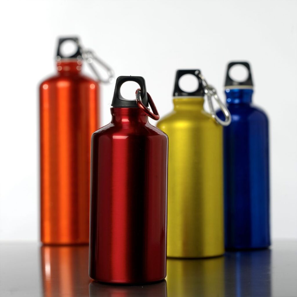 10 Essential Things to Pack For Your Trip To Hawai'i Hawaii Calling a group of colorful water bottles