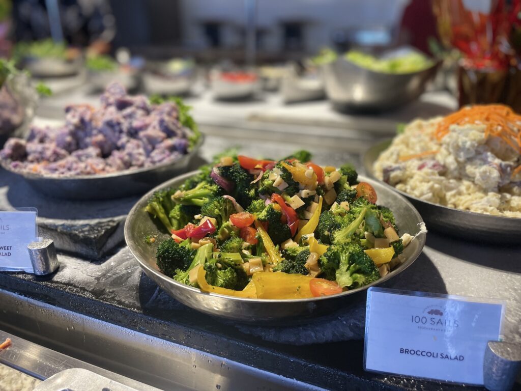 100 Sails Sunday Brunch | Prince Waikiki | A Favorite Hawaii Calling bowls of salads on a counter