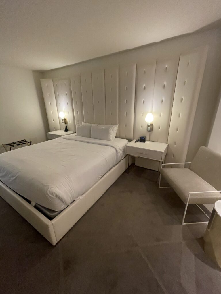 Delano Las Vegas Clean Air Oasis | Review & Video Hawaii Calling a bed with a chair and a table