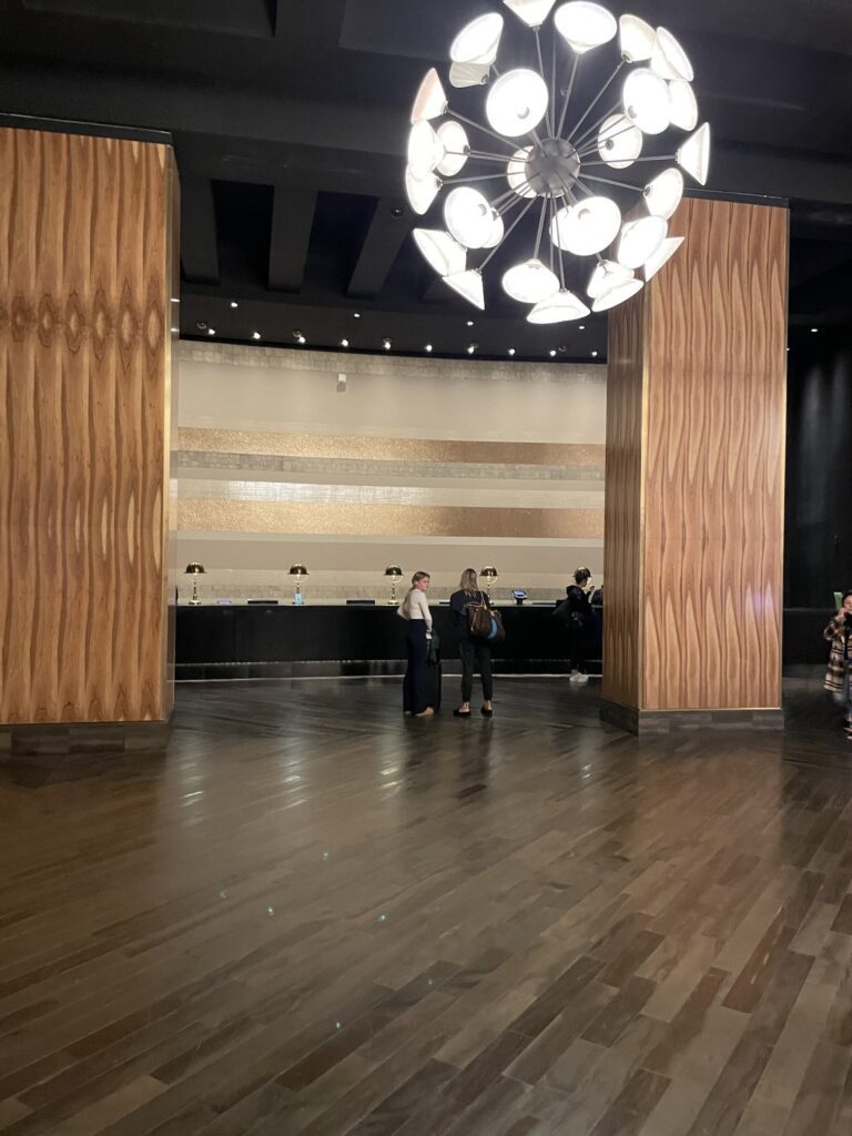 Delano Las Vegas Clean Air Oasis | Review & Video Hawaii Calling a group of people standing in a room