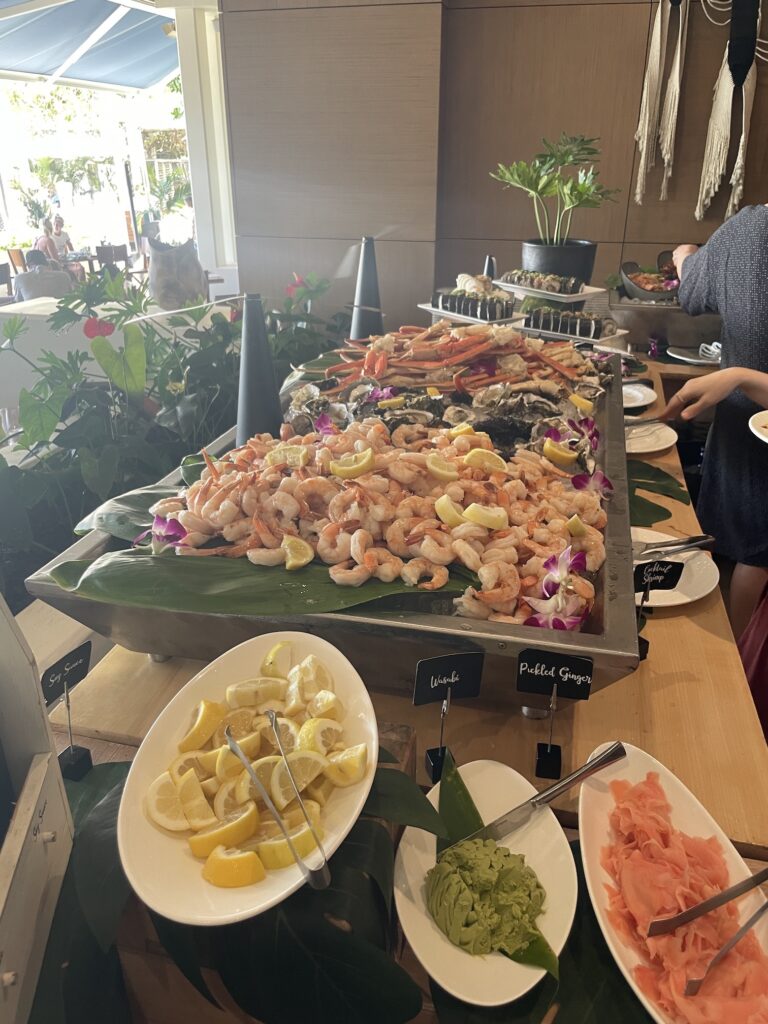 Delightful La Hiki Sunday Brunch | Four Seasons Oahu Hawaii Calling a buffet table full of food