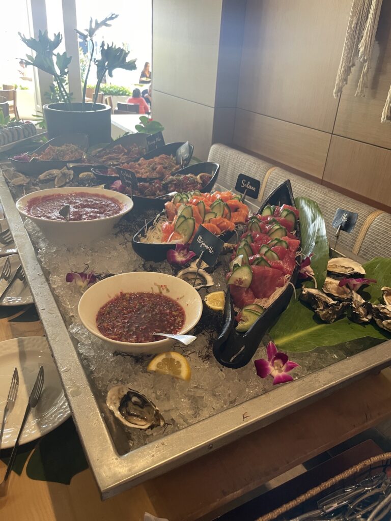 Delightful La Hiki Sunday Brunch | Four Seasons Oahu Hawaii Calling a tray of food on a table