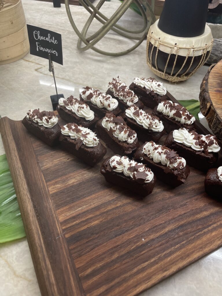Delightful La Hiki Sunday Brunch | Four Seasons Oahu Hawaii Calling a tray of chocolate desserts