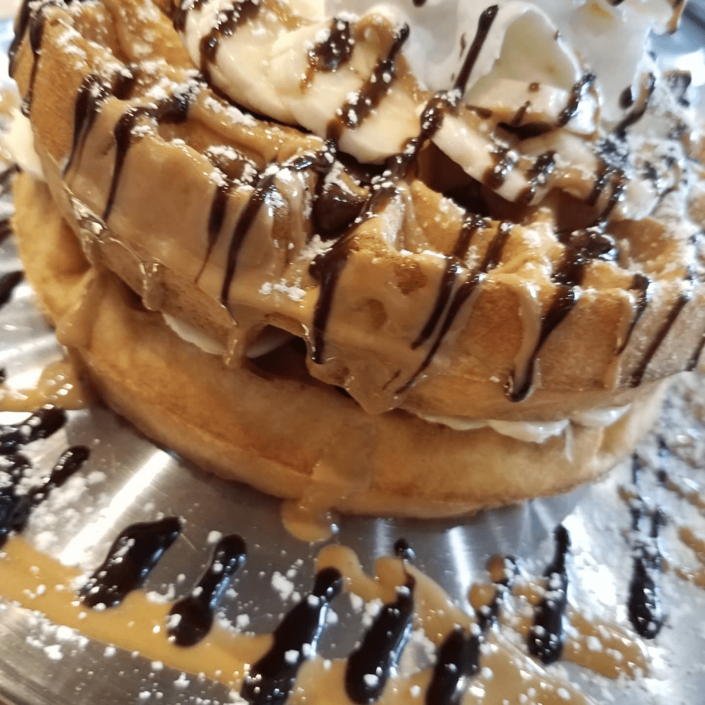 7 Best Ice Cream Shops In Maui | Island Guide Hawaii Calling a waffle with whipped cream and chocolate syrup